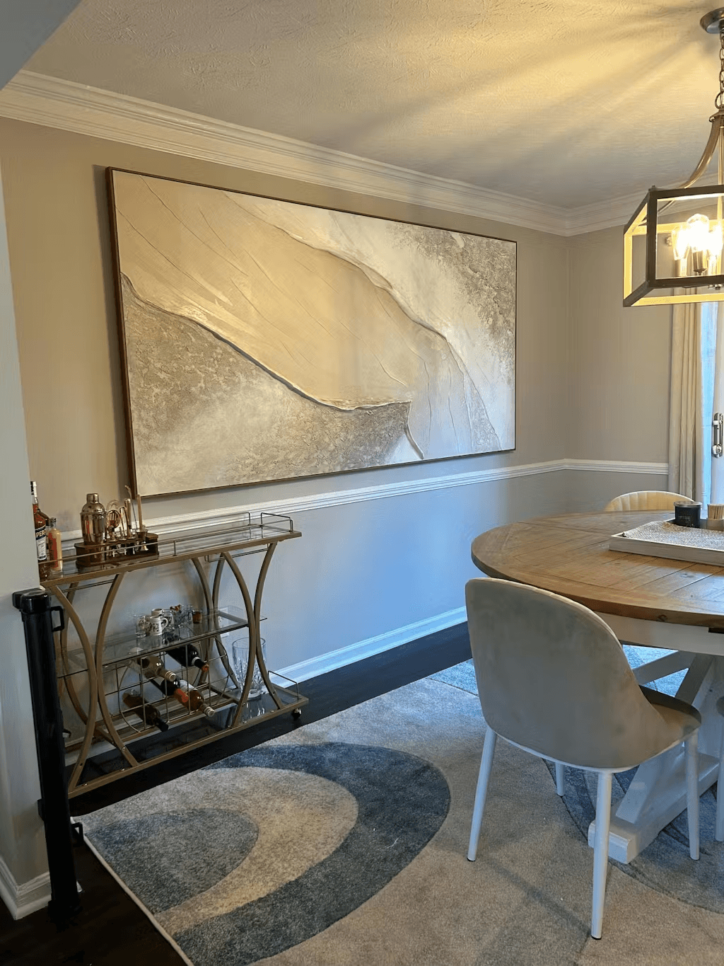 Large custom texture painting installed in a dining room
