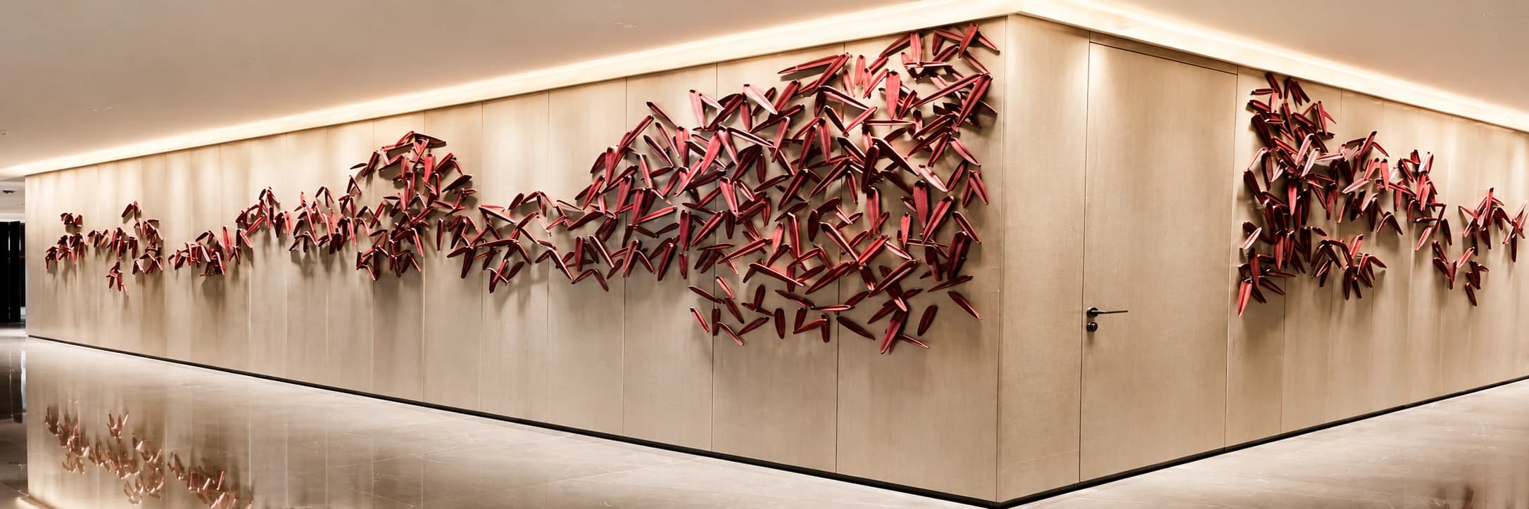 Large-scale sculptural wall art developed by DEWANG ART for a hotel interior