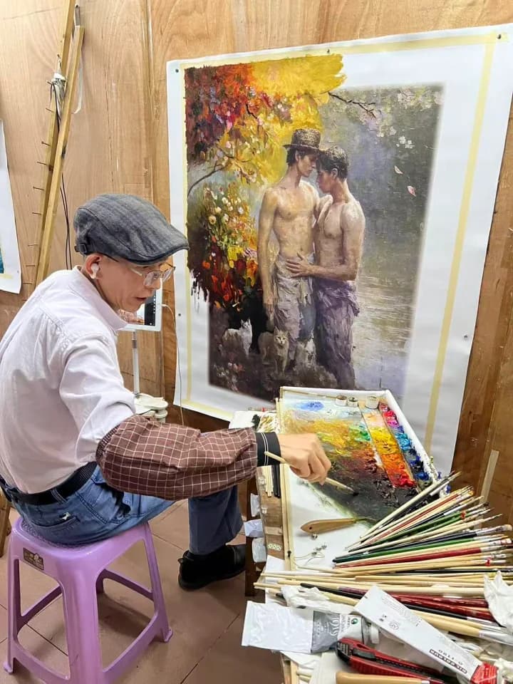 Professional artist mixing colors while developing a figurative oil painting