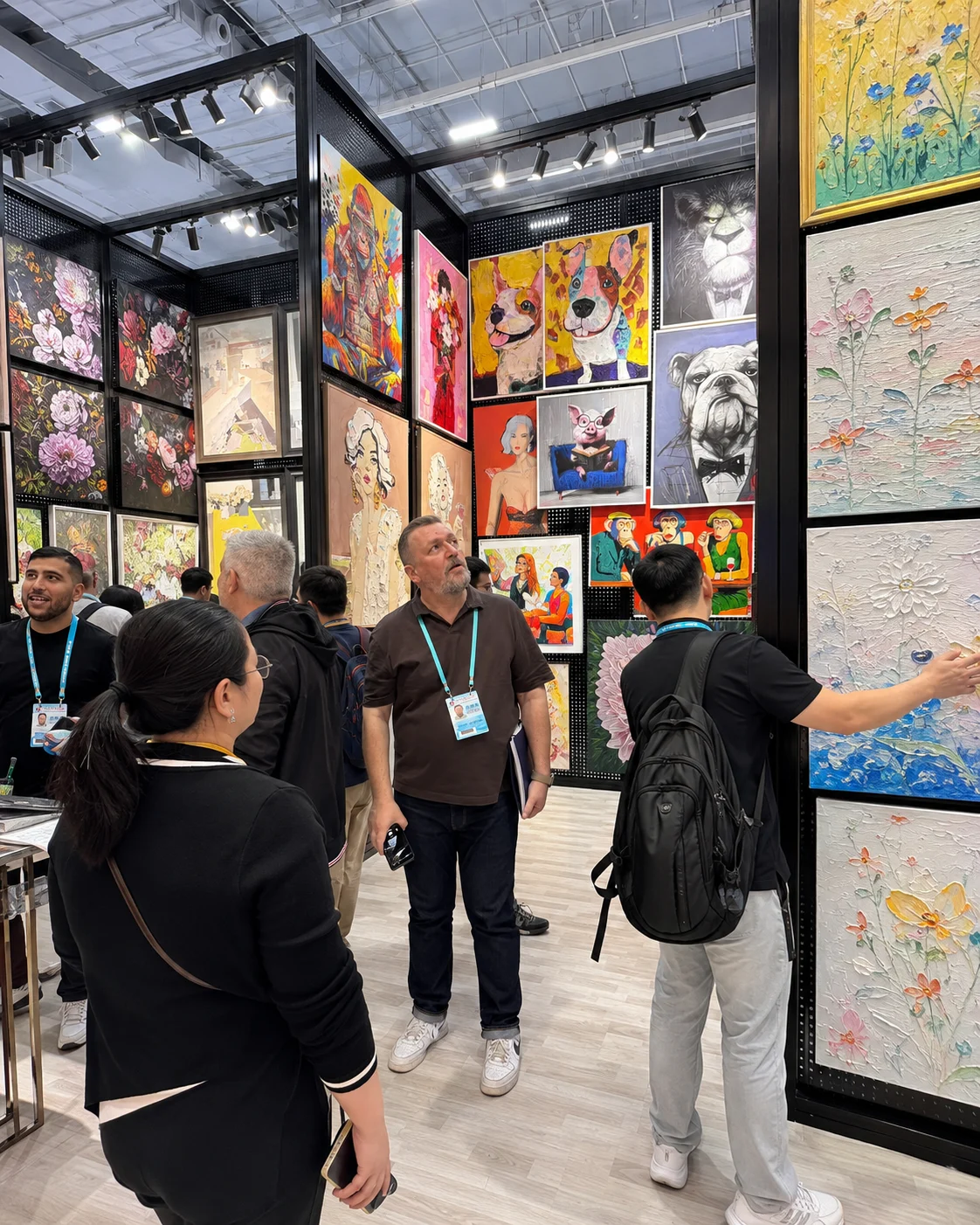 International buyers viewing DEWANG artwork at an exhibition