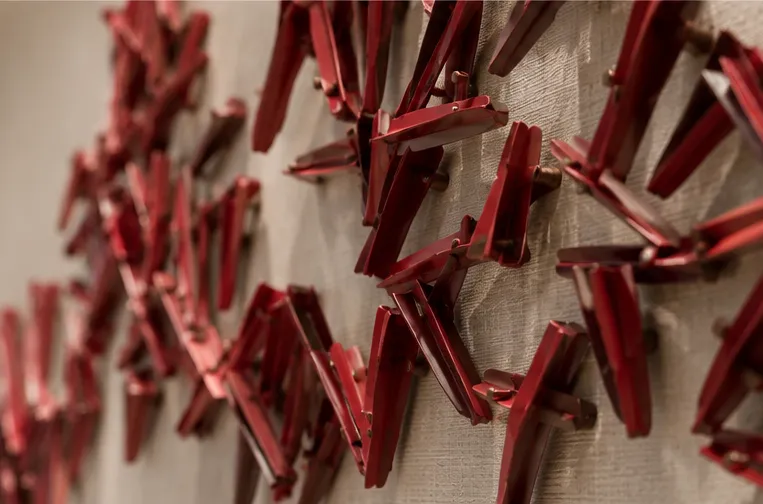 Side close-up showing depth and layered construction of the wall artwork